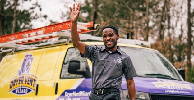 Smiling technician waving.