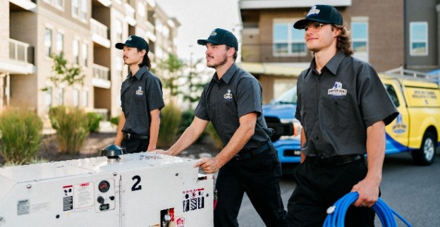 Dryer Vent Wizard techs ready to perform multi-unit dryer vent cleaning service