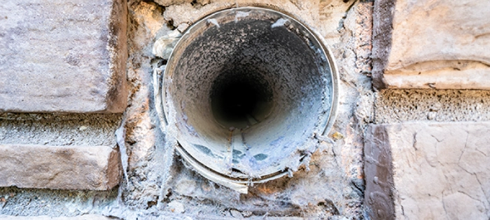 Lint inside of a dryer vent.