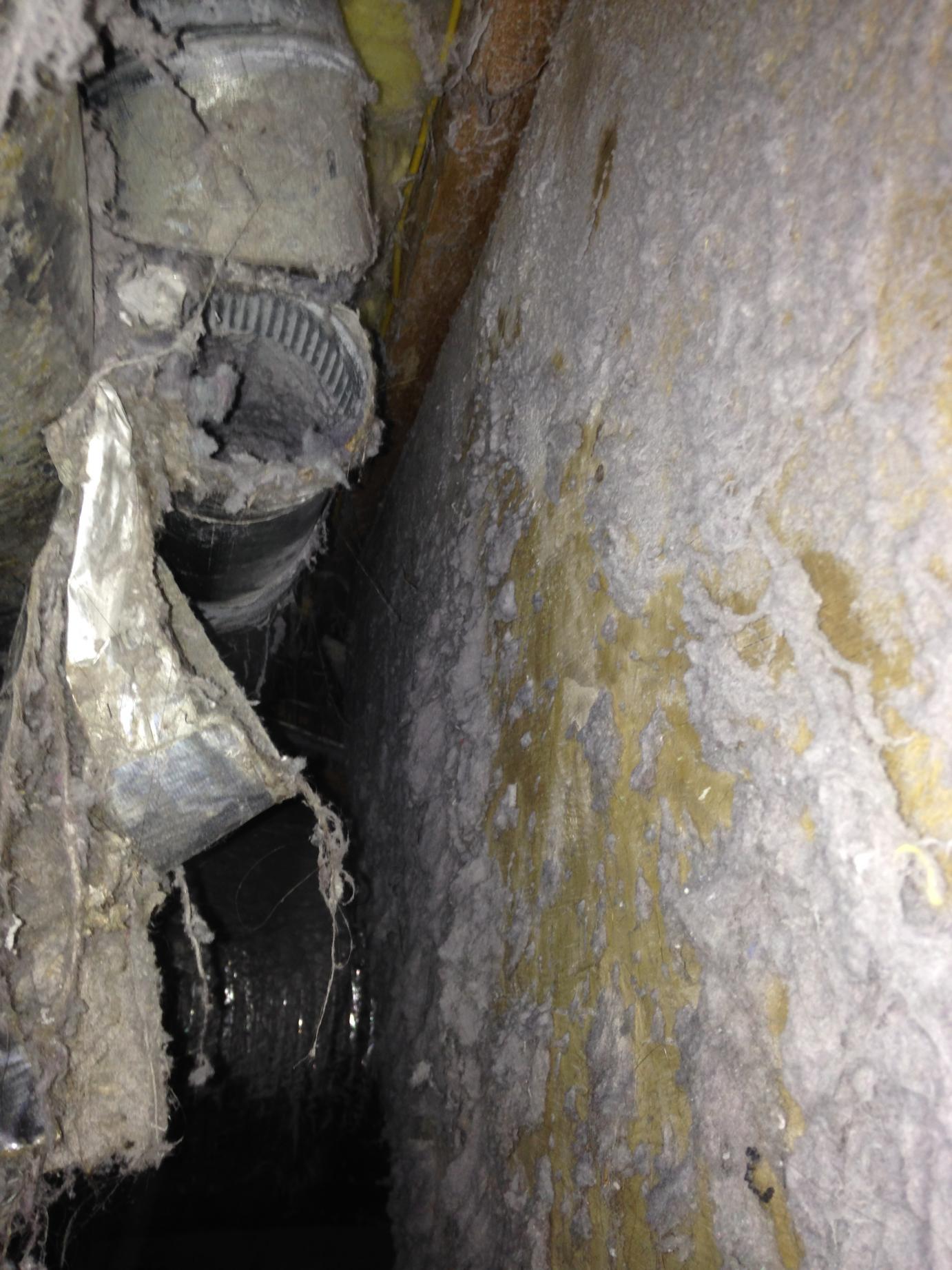 A picture of a busted dryer vent system.