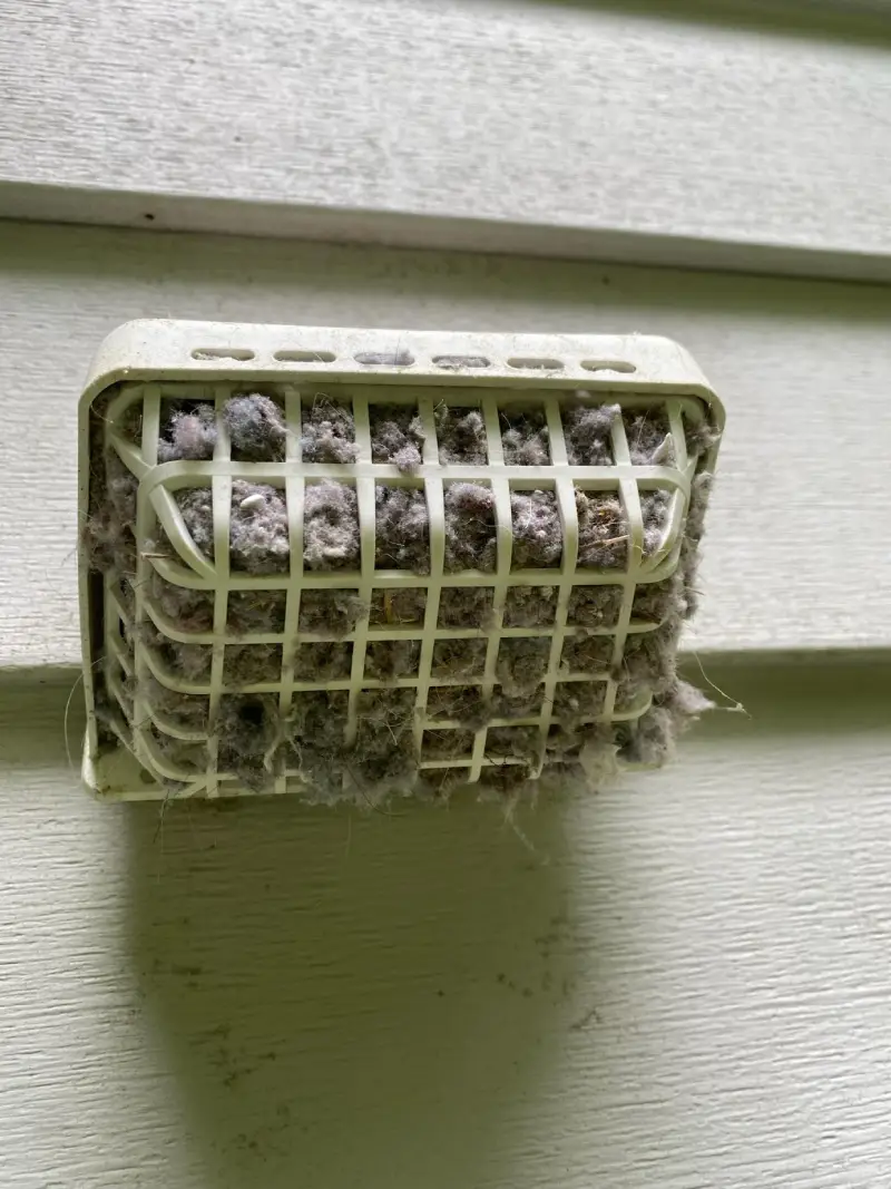 A clogged dryer vent exhaust.