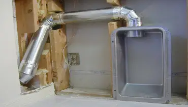 A picture of a newly installed dryer vent system.